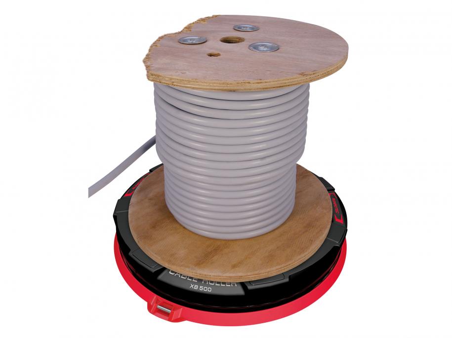 RUNPOTEC X-Board XB 500 Red and Black Universal cable drum rewinder and unwinder for all types of cables and pipes. Example photo of roller in use with grey cable on damaged drum (not supplied). 