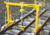 Yellow Camlok CR Single Rail Clamp in use set up with other products